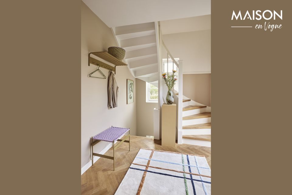 Rugs play many roles in our living rooms