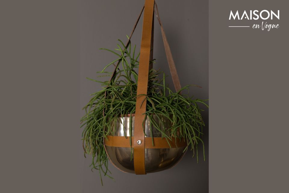 The Oasis planter is a large bowl designed in aluminium and lacquered brass