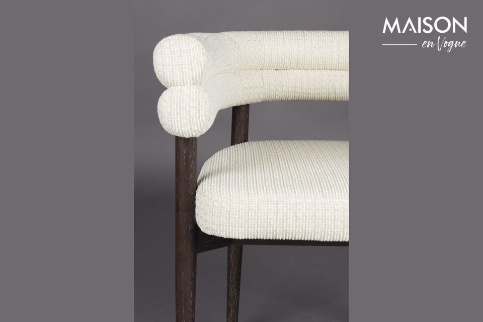 The Sela chair is a focal point of warmth and conviviality in your dining room