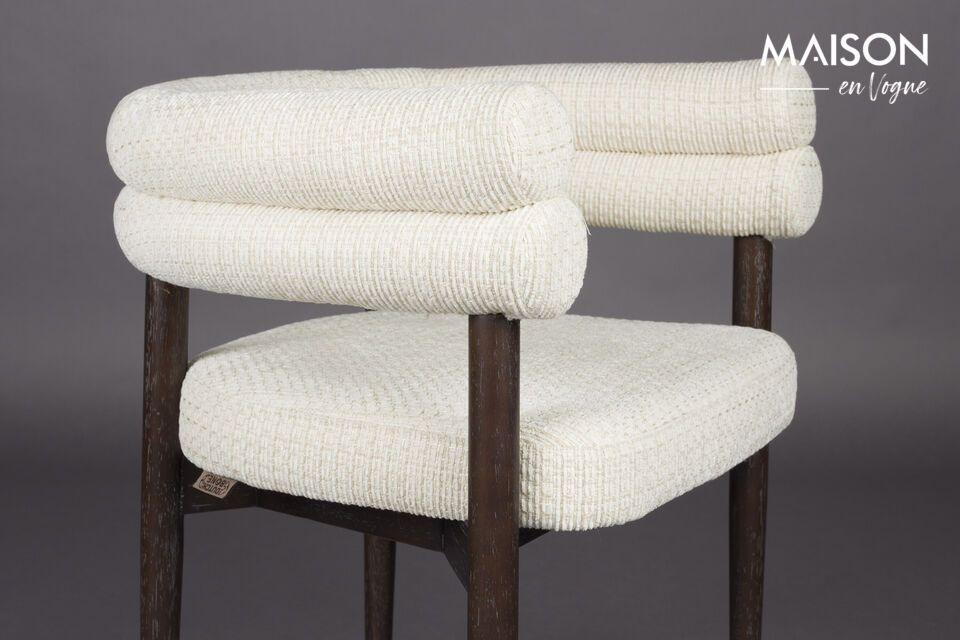 Its delicate, soothing off-white fabric invites you to escape and relax