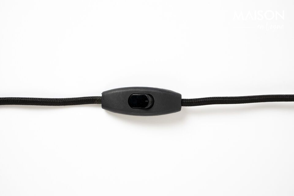 Its iron base features a playful