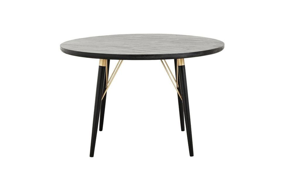 This round dining table is endowed with refined details with beautifully rounded spindle-shaped legs