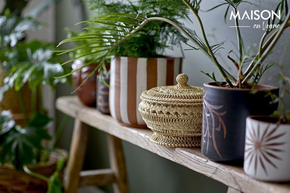 A basket with lid by Bloomingville in a cosy spirit