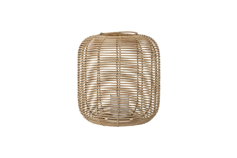A decorative object, this lantern gives off a soft, warm light perfect for late summer nights!
