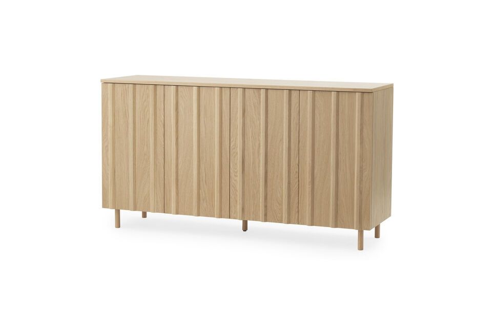 The design is inspired by the architecture of Nordic summerhouses from the 1960s with wooden slats