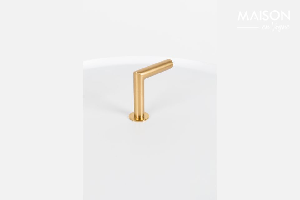 The refinement of a side table combining brass and white