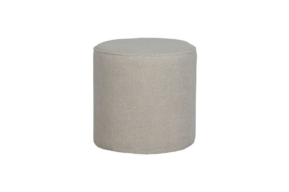 This practical and stylish round pouf is a versatile addition to any living space