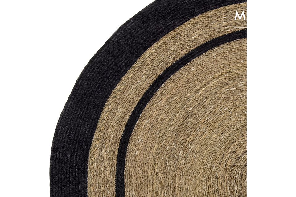 Bloomingville\'s Lune rug is made of 100% woven jute; it has a circular shape and black stripes