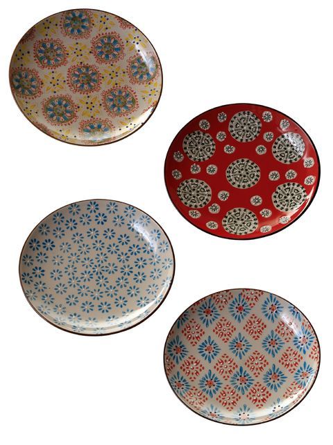 A set of 4 ceramic dinner plates