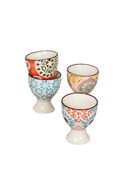These four elegant Bohemian egg cups are decorated with graphic motifs and beautifully coloured