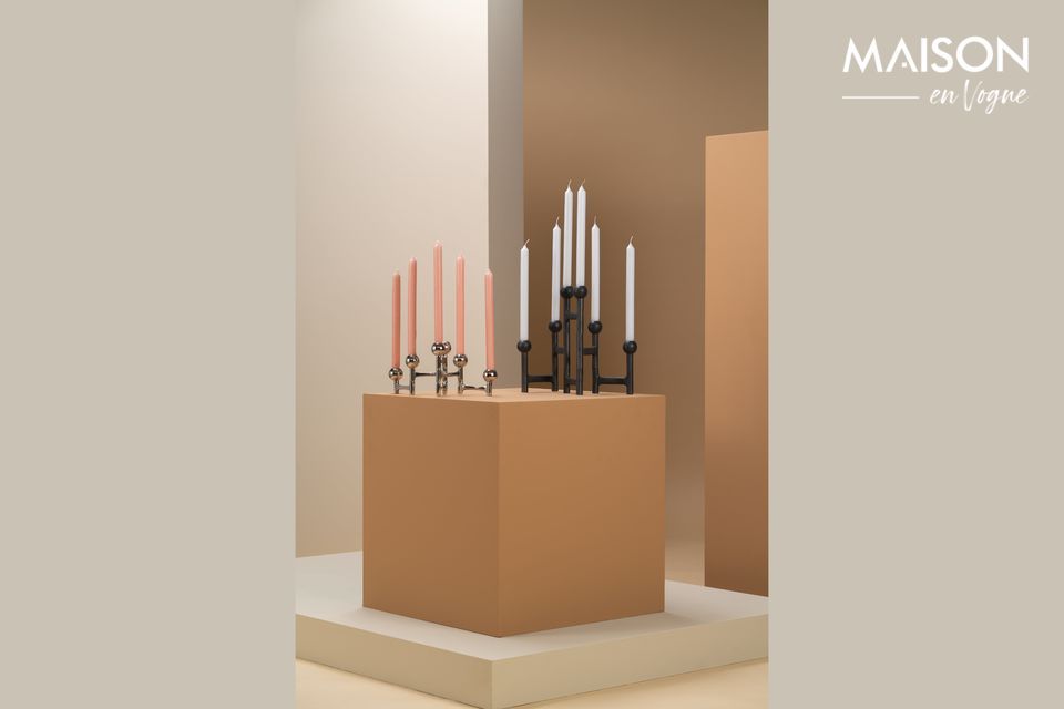 Round folding candleholder in nickel-plated aluminum, sober and elegant.