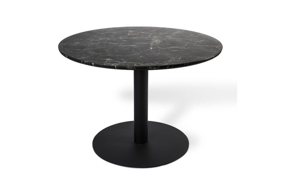 Round dining table. Black marbled stone aspect