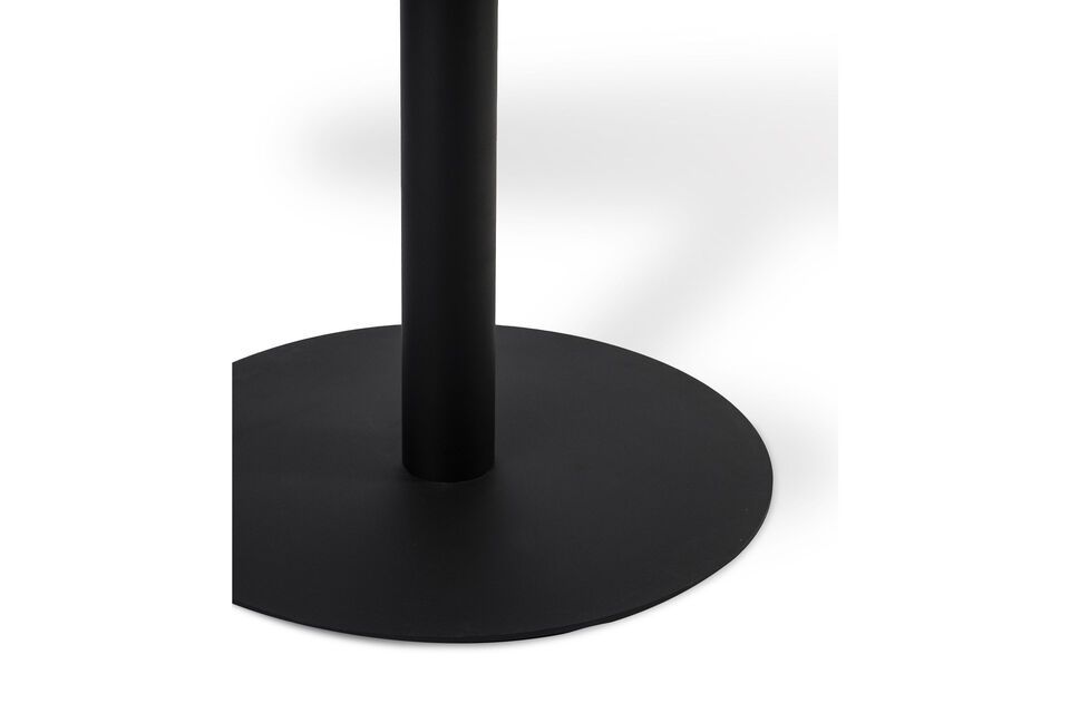 The black marble-look Slab dining table is a contemporary piece of living room furniture with