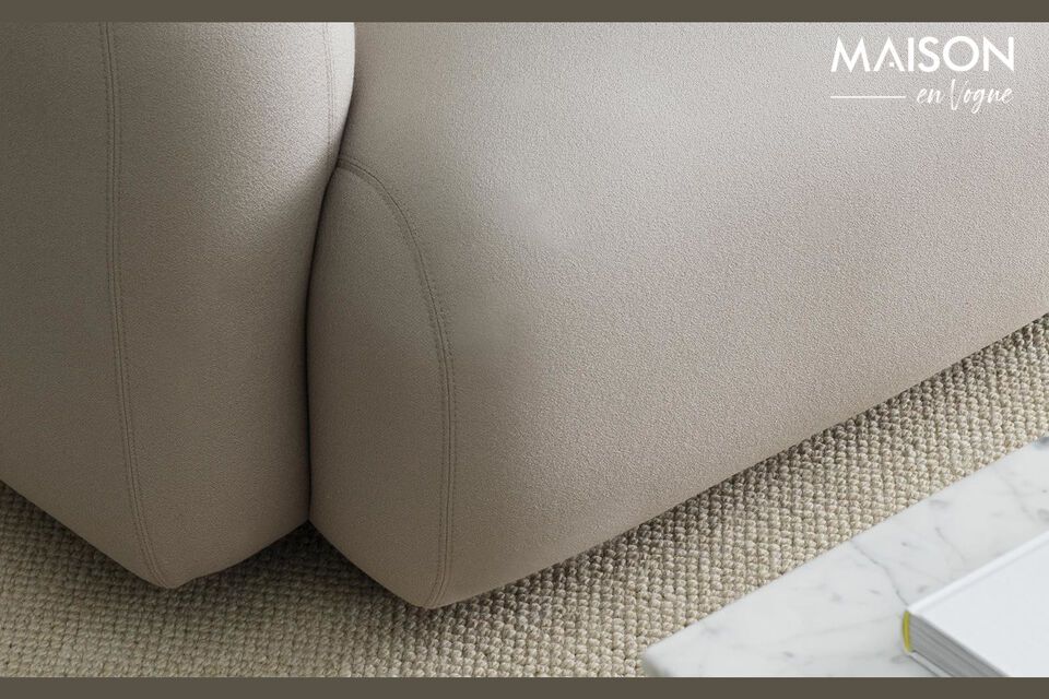 The stitching on the back and the seats divides the sofas into sections and completes the feel