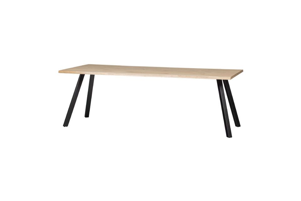 The two matte black metal legs of this table