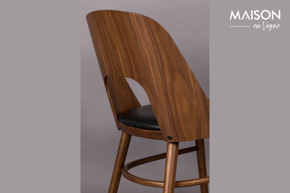 This pretty chair combines wood and PU leather in a very successful way by playing with the material