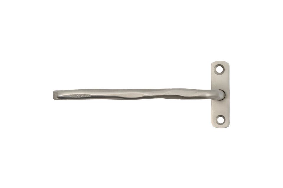 This toilet paper holder features a subtly irregular surface for a finish full of character