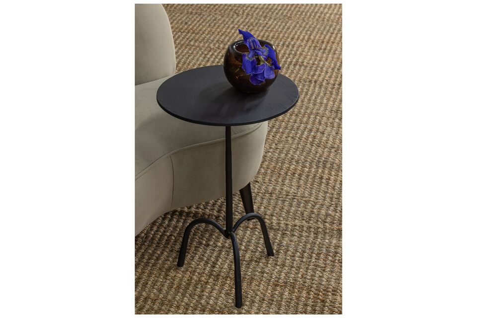 The Trey black metal side table has a minimalist design and is very lightweight