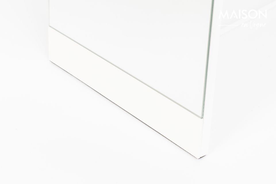 A standing mirror with a solid steel structure
