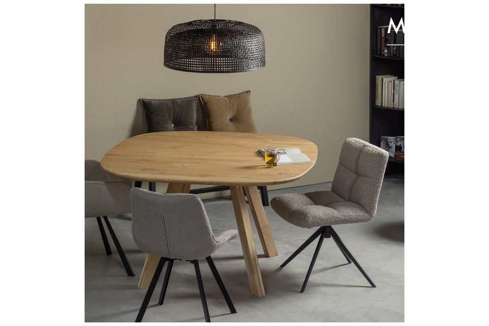 Add a touch of comfort to your dining room with this chair on a swivel base