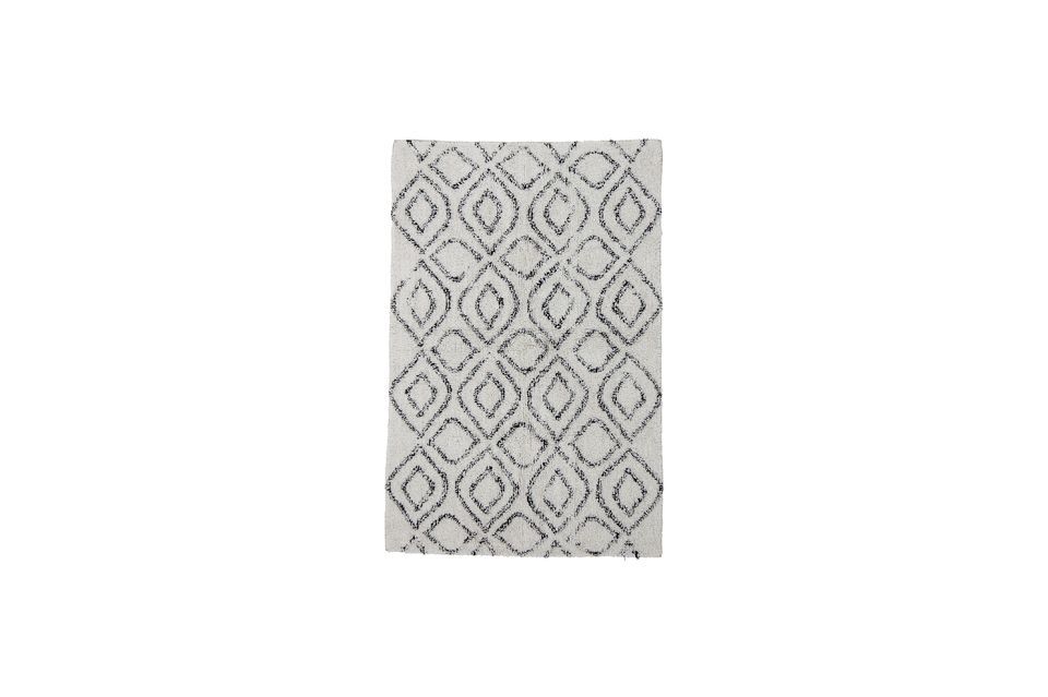 The Katie rug from Bloomingville is made of cotton and features a beautiful black printed pattern on