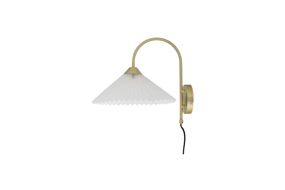 The Firdes Wall Sconce from Bloomingville is a practical iron lamp in a beautiful brass color with a
