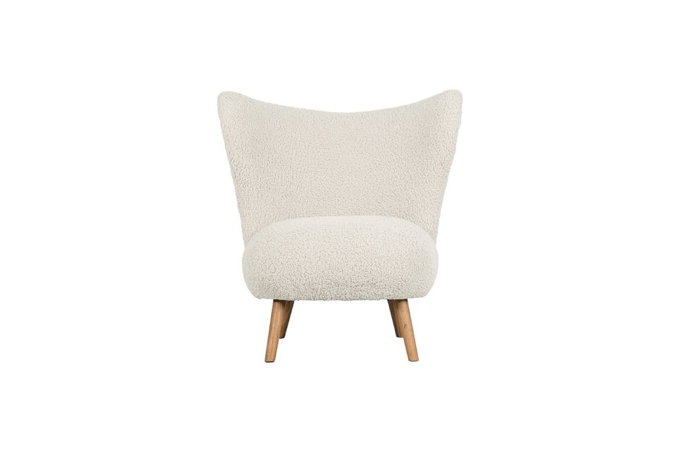 The Céline white sheepskin effect armchair is a very trendy seat