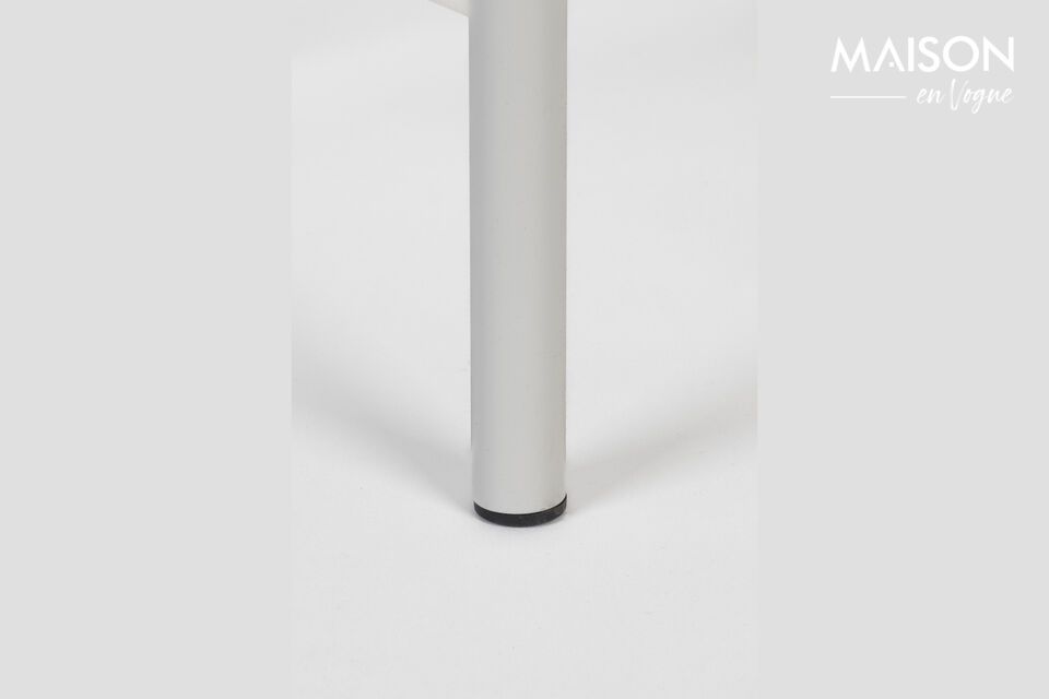 This side table lends itself to multiple associations: a delicately laid book