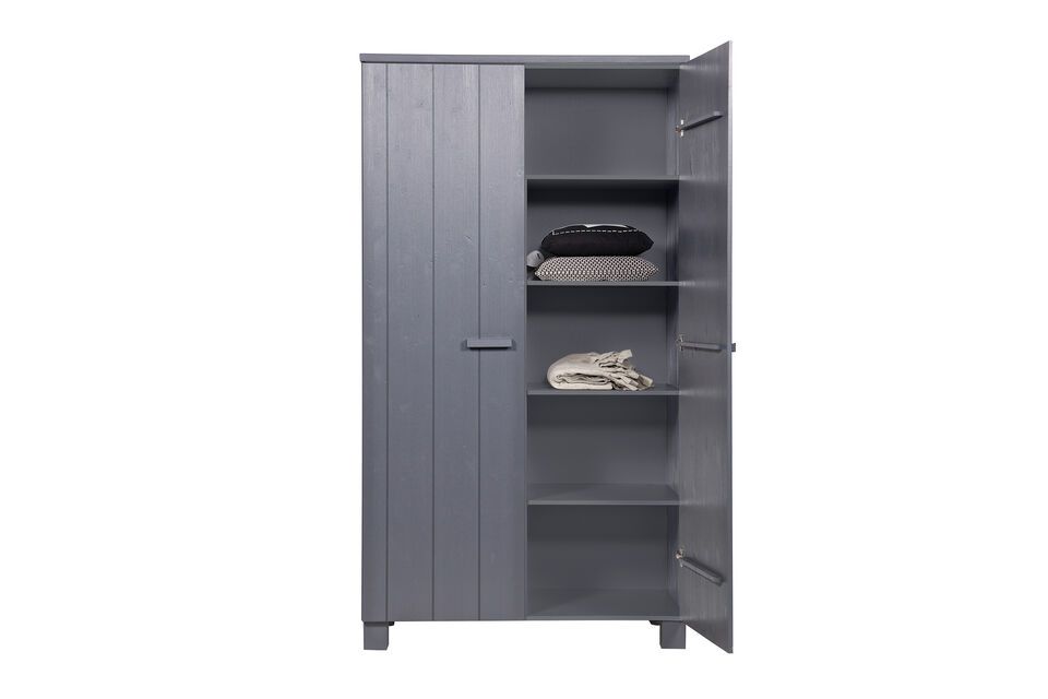 Robust and solid, this Dennis wardrobe from the Dutch brand WOOD has a sleek and trendy design